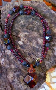 Garnet with lava stone and ebony wood